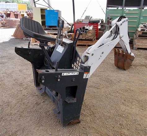 used backhoe attachment for a skid steer loader|used skid steer sweeper attachment.